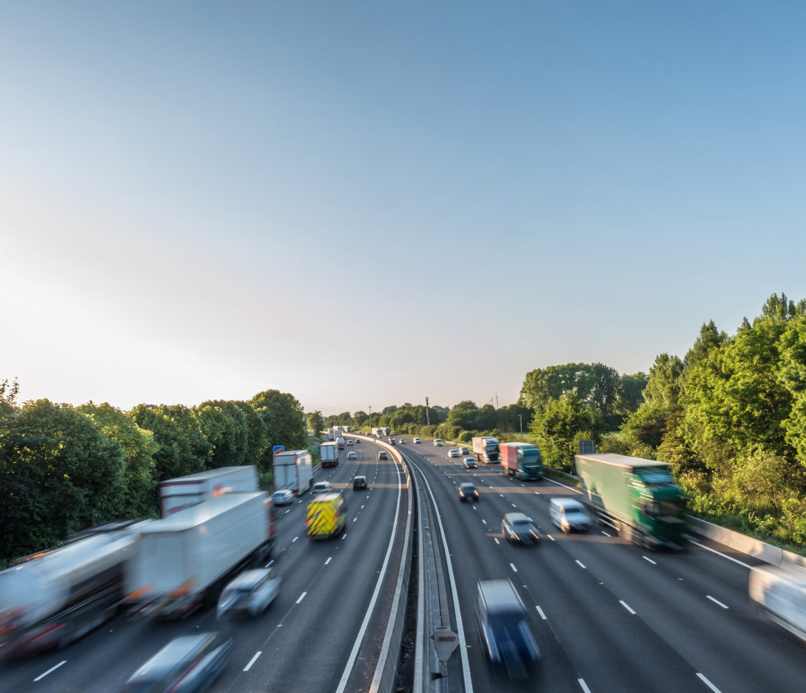 Trucks and cars on motorway